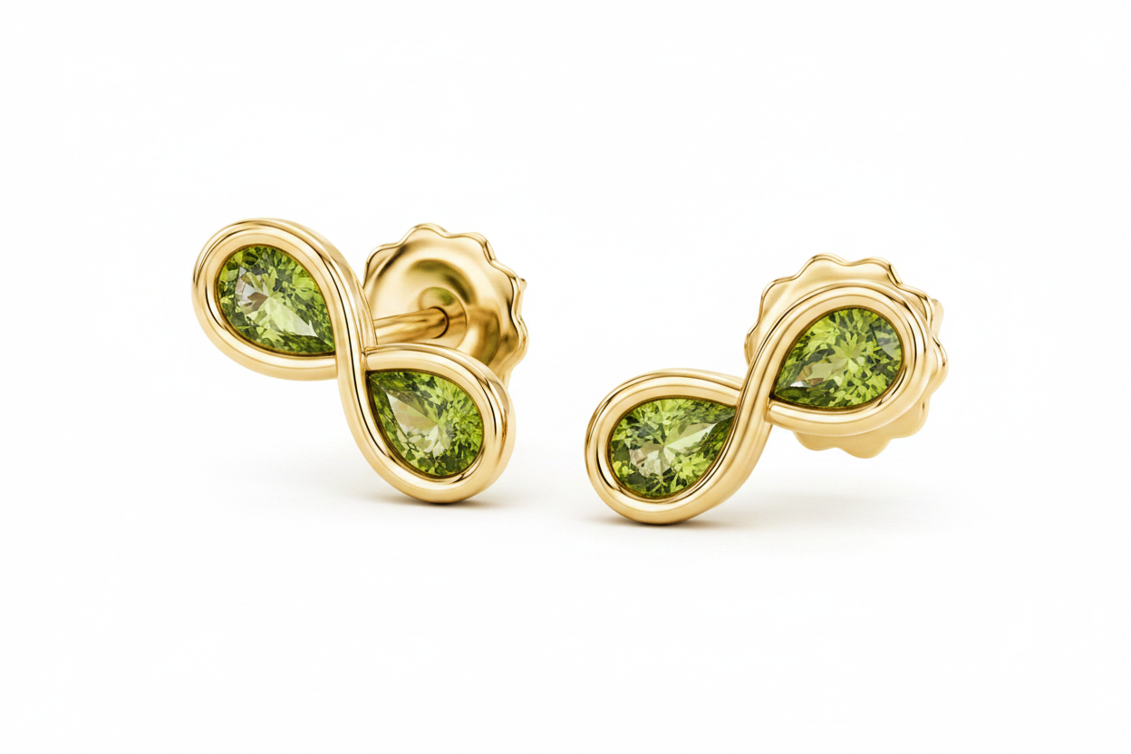 Gold earrings with diamond accents on a white background