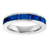 Silver ring with blue gemstones on a white background