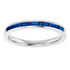 white gold ring with blue gemstones on a white background, an anniversary band
