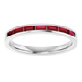 Silver ring with red gemstones on a white background