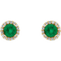 Pair of emerald green gemstone earrings with gold and diamond accents on a white background