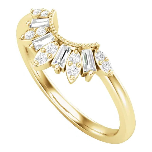 Gold ring with diamond accents on a white background